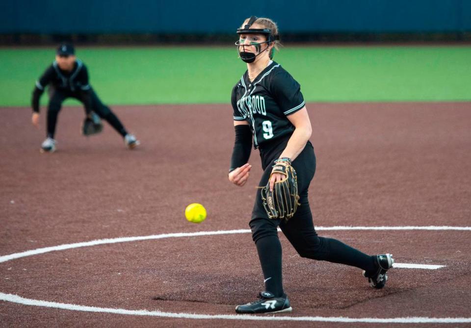 Kentwood pitcher Sarah Wright (9) pitches during the third inning of a non-conference varsity softball game against Auburn Riverside at Auburn Riverside High School in Auburn, Wash. on April 25, 2023. Kentwood defeated Auburn Riverside 3-0.