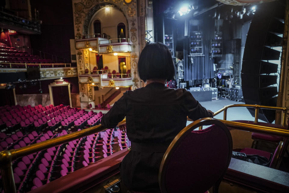 Apollo President and CEO Jonelle Procope, who will be ending her 20-year run leading the organization on June 12, looks out at the Apollo Theatre stage from a mezzanine seat, Monday June 5, 2023, in New York. Procope's critical fundraising have worked to restore the theatre to its former glory. (AP Photo/Bebeto Matthews)