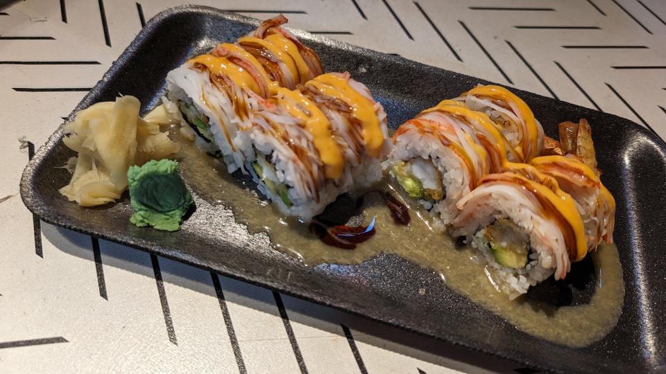 The signature sushi roll called "Shaggy Dog" is made with shrimp tempura, avocado, crab, eel sauce and a spicy aioli at Nama Sushi in Central Market.