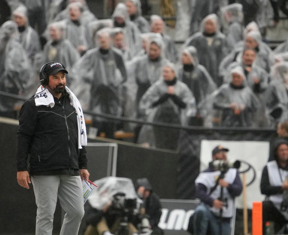 Oct. 14, 2023; Lafayette, In., USA; 
Ohio State Buckeyes head coach Ryan Day looks on as the rain falls during the second half of Saturday's NCAA Division I football game against the Purdue Boilermakers at Ross-Ade Stadium in Lafayette.