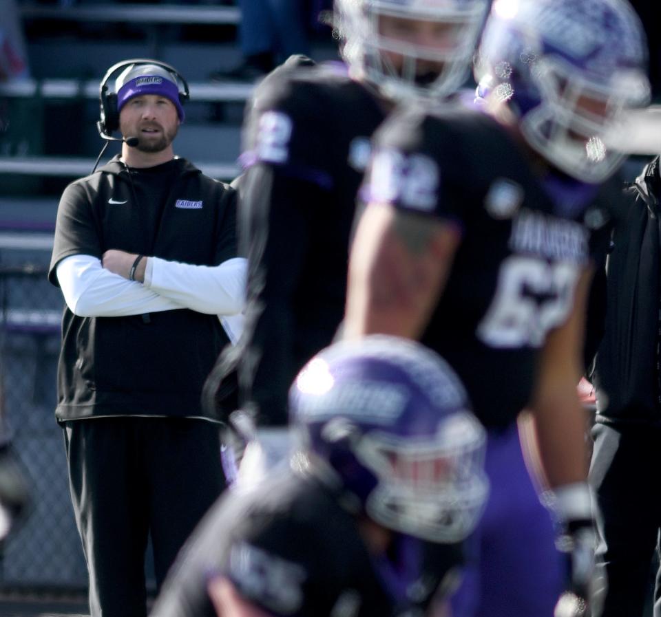 Mount Union head coach Geoff Dartt watches play in the second quarter of Mount Union vs Alma in NCAA Division III playoff at Mount Union. Saturday, November 25, 2023.