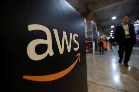 FILE PHOTO: The logo of Amazon Web Services (AWS) is seen during the 4th annual America Digital Latin American Congress of Business and Technology in Santiago, Chile, September 5, 2018. REUTERS/Ivan Alvarado/File Photo