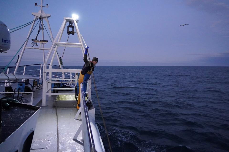 Fishermen work aboard the Good Fellowship fishing trawler, while its nets trawl the sea bed for prawns and other crustaceans, in the North Sea, off the coast of North Shields, in northeast England on January 21, 2020. - Just before dawn, the Good Fellowship trawler casts its nets into the North Sea's cold swirling waters, fishing for prawns off England's northeast coast. Britain finally departs the European Union on Friday but remains bound by the bloc's Common Fisheries Policy (CFP) until the end of a transition period on December 31. (Photo by William EDWARDS / AFP) (Photo by WILLIAM EDWARDS/AFP via Getty Images)