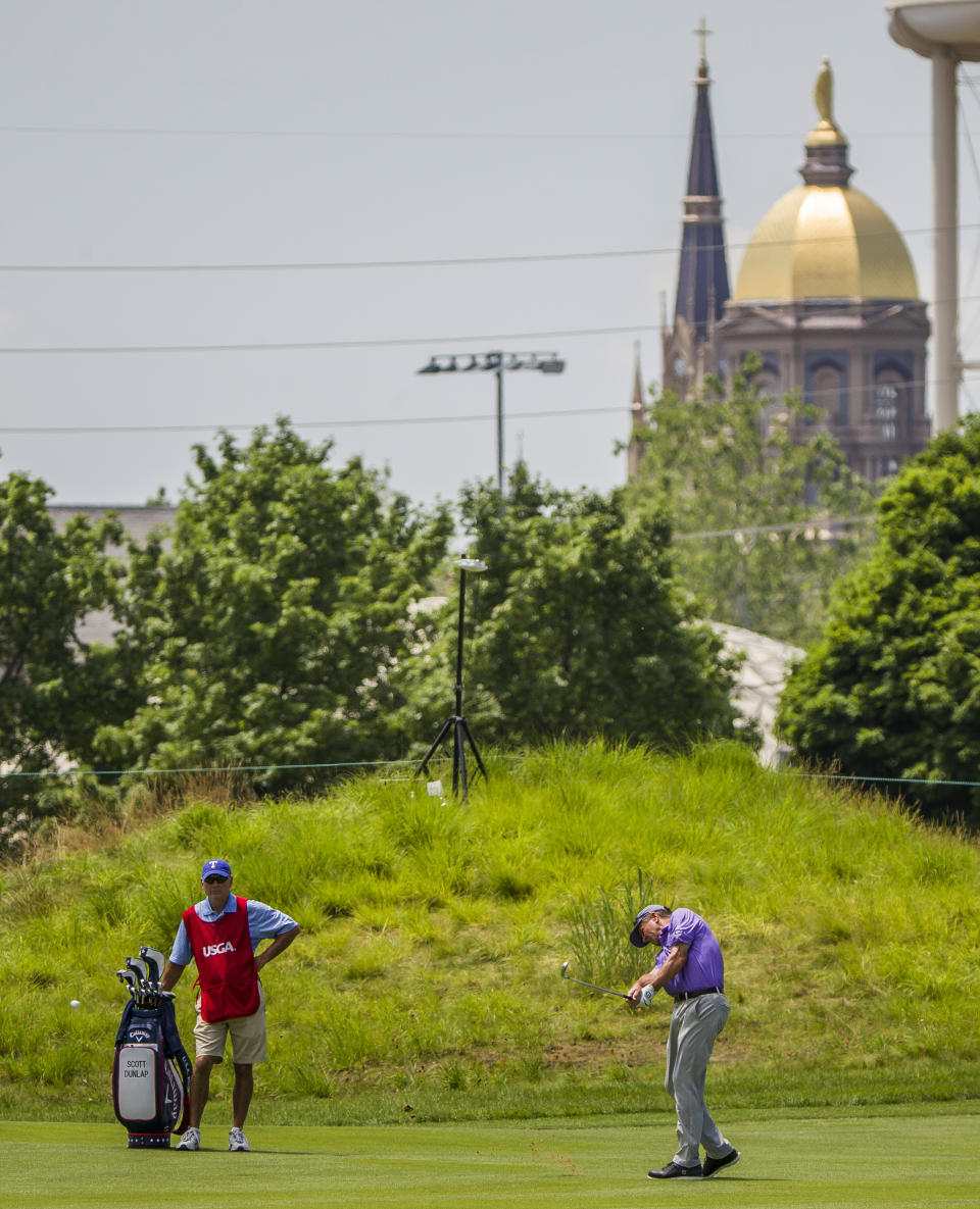 Scott Dunlap hits on the 14th hole during the third round of the U.S. Senior Open golf tournament Saturday, June 29, 2019, at Warren Golf Course in South Bend, Ind. (Robert Franklin/South Bend Tribune via AP)