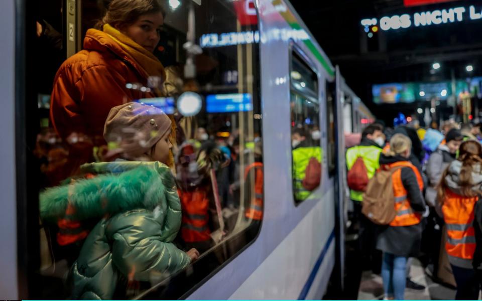 Ukrainians arrive on a train from Warsaw at Hauptbahnhof main railway station in Berlin - Hannibal Hanschke /Getty Images Europe