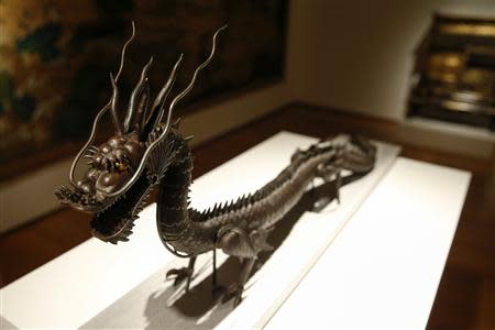 A Japanese iron articulated model of a dragon from the Edo period (18th and 19th century) is seen on display during ''The Spring 2-14 Sales of Asian Art Week" media preview at Christie's Auction House in New York March 13, 2014. REUTERS/Shannon Stapleton