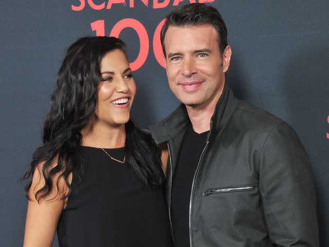 <p>Gregg DeGuire/WireImage</p> Scott Foley and wife Marika Dominczyk arrive at ABC's "Scandal" 100th episode celebration.