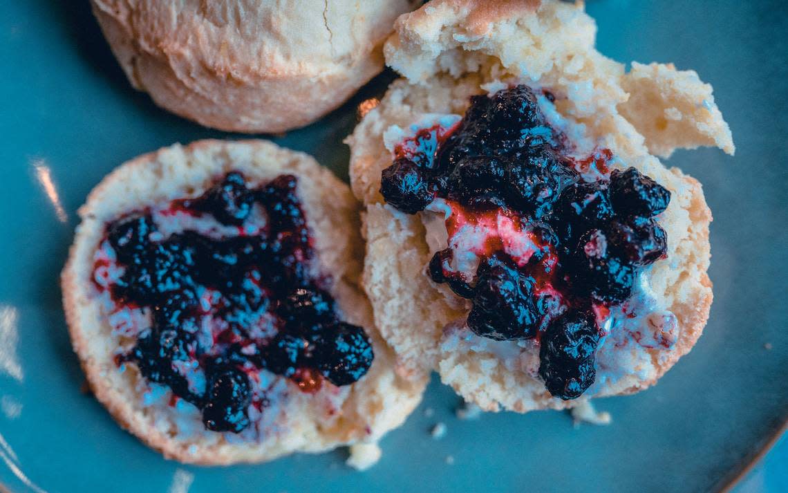 Tupelo Honey Southern Kitchen & Bar is known for its Southern and Appalachian food with a modern twist, including cathead buttermilk biscuits served with blueberry jam. Provided