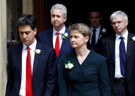 The former leader of Britain's opposition Labour Party Ed Miliband (L) and Labour MP Yvette Cooper walk from Parliament to St Margaret's Church for a service of rememberance for Labour MP Jo Cox who was shot and stabbed to death last week outside her constituency surgery, in Westminster, London, June 20, 2016. REUTERS/Stefan Wermuth