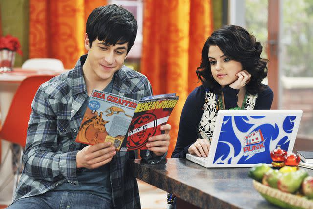 <p>Eric McCandless/Disney Channel/Getty</p> Wizards of Waverly Place's David Henrie and Selena Gomez