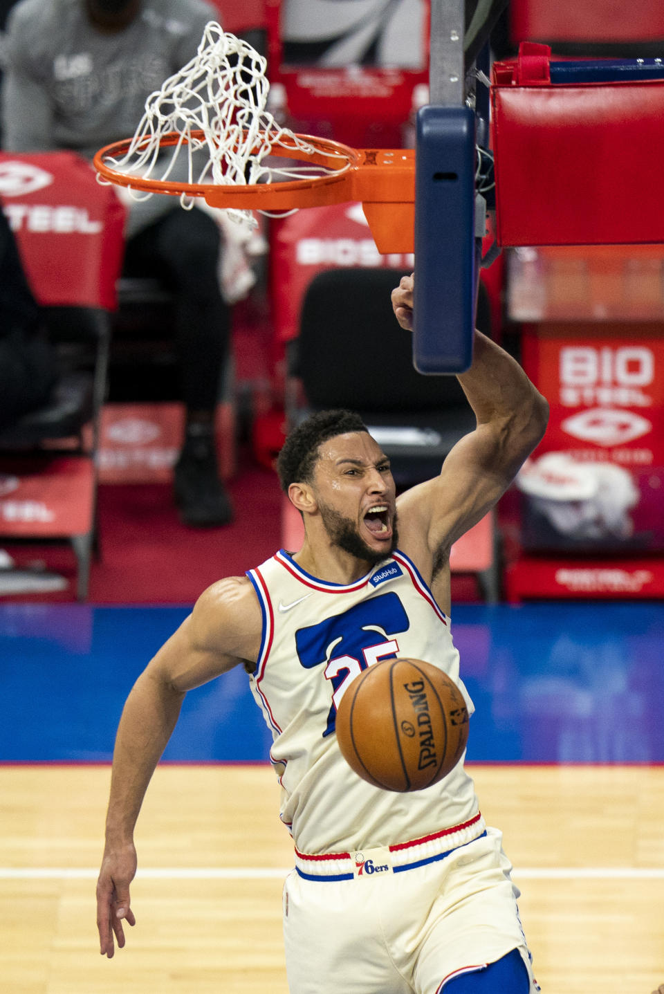 Philadelphia 76ers' Ben Simmons reacts to his dunk during the first half of an NBA basketball game against the San Antonio Spurs, Sunday, March 14, 2021, in Philadelphia. (AP Photo/Chris Szagola)