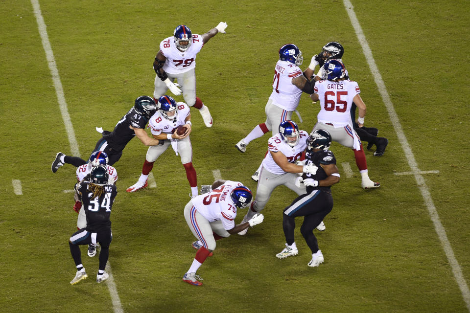 New York Giants' Daniel Jones (8) is sacked by Philadelphia Eagles' Nathan Gerry (47) during the second half of an NFL football game, Thursday, Oct. 22, 2020, in Philadelphia. (AP Photo/Derik Hamilton)