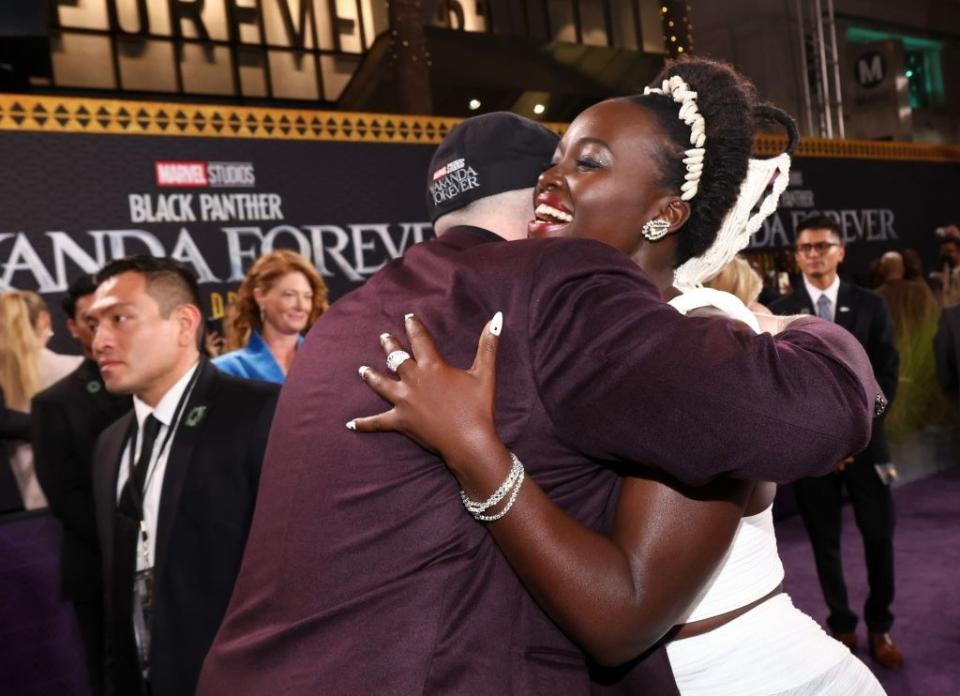 Lupita and Feige hugging