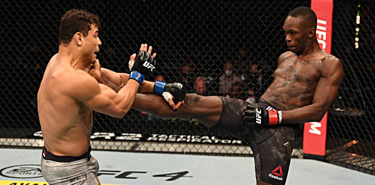 Israel Adesanya lands front kick on Paulo Costa at UFC 253