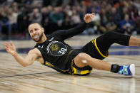 Golden State Warriors guard Stephen Curry (30) looks to a referee for a foul call during the second half of an NBA basketball game against the Minnesota Timberwolves, Wednesday, Feb. 1, 2023, in Minneapolis. (AP Photo/Abbie Parr)