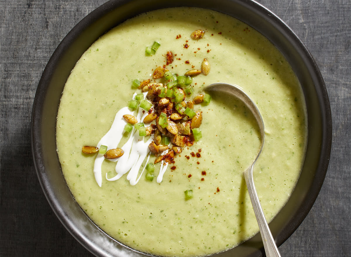 keto avocado soup in bowl with spoon