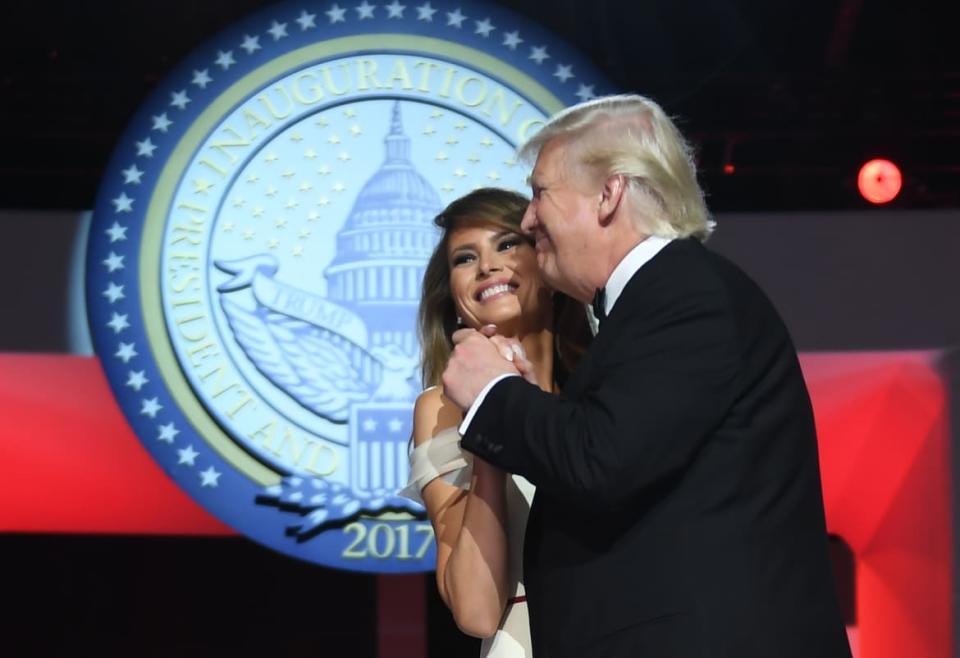 <div class="inline-image__caption"><p>Donald and <span class="caas-xray-inline-tooltip"><span class="caas-xray-inline caas-xray-entity caas-xray-pill rapid-nonanchor-lt" data-entity-id="Melania_Trump" data-ylk="cid:Melania_Trump;pos:2;elmt:wiki;sec:pill-inline-entity;elm:pill-inline-text;itc:1;cat:OfficeHolder;" tabindex="0" aria-haspopup="dialog"><a href="https://search.yahoo.com/search?p=Melania%20Trump" data-i13n="cid:Melania_Trump;pos:2;elmt:wiki;sec:pill-inline-entity;elm:pill-inline-text;itc:1;cat:OfficeHolder;" tabindex="-1" data-ylk="slk:Melania Trump;cid:Melania_Trump;pos:2;elmt:wiki;sec:pill-inline-entity;elm:pill-inline-text;itc:1;cat:OfficeHolder;" class="link ">Melania Trump</a></span></span> dance during the Freedom Ball following his inauguration.</p></div> <div class="inline-image__credit">Jim Watson/AFP via Getty</div>