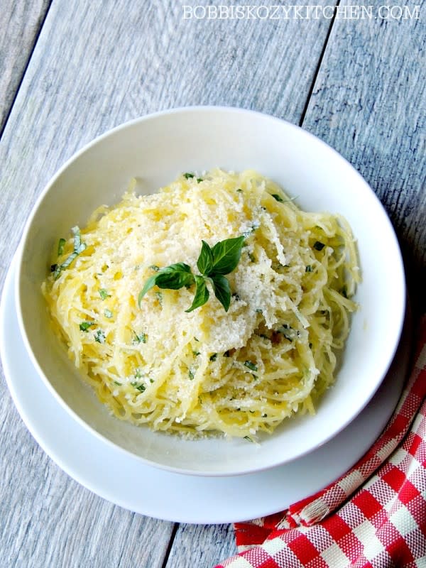 <p>Bobbi's Kozy Kitchen</p><p>This Herbed Spaghetti Squash with Garlic and Parmesan recipe is Keto friendly, Low-carb, Gluten-free, vegetarian, and a perfect side dish for any protein.</p><p><strong>Get the recipe: </strong><a href="https://www.bobbiskozykitchen.com/2016/11/herbed-spaghetti-squash-with-garlic-and.html" rel="nofollow noopener" target="_blank" data-ylk="slk:Herbed Spaghetti Squash with Garlic and Parmesan;elm:context_link;itc:0;sec:content-canvas" class="link "><strong>Herbed Spaghetti Squash with Garlic and Parmesan</strong></a></p>