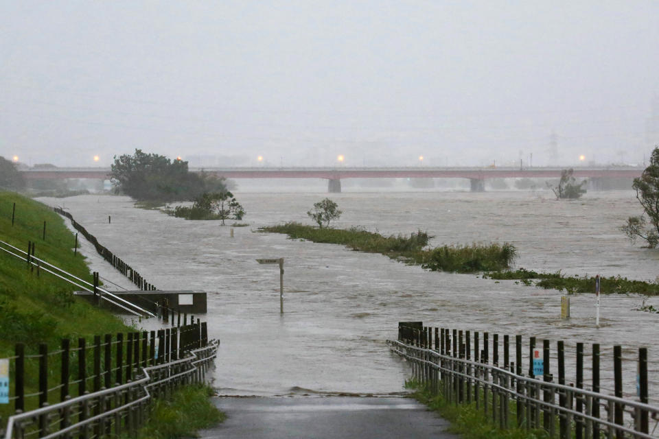 Swollen water levels along Tama river are pictured after heavy rains brought by approaching Typhoon Hagibis hit the Tokyo area on October 12, 2019. - Powerful Typhoon Hagibis roared towards Japan's coast on October 12, killing one person and bringing "unprecedented" downpours that prompted authorities to issue their highest-level rain disaster warning. (Photo by STR / JIJI PRESS / AFP) / Japan OUT (Photo by STR/JIJI PRESS/AFP via Getty Images)