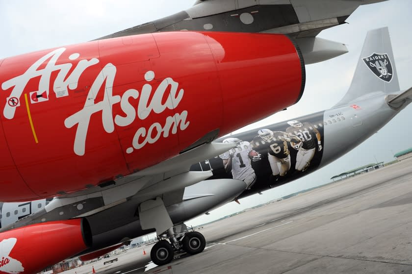 AirAsia Group Berhad's stocks up Hong Kong tycoon Stanley Choi increased his stakes in the Malaysian low-cost carrier. — AFP pic