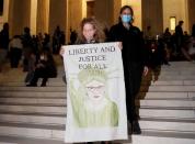 People mourn the death of Associate Supreme Court Justice Ruth Bader Ginsburg at the Supreme Court in Washington