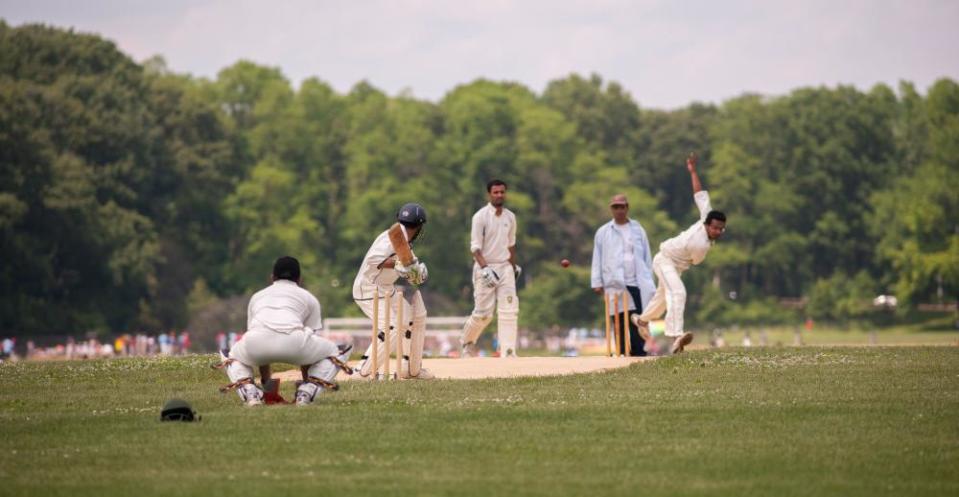 people play cricket in the park