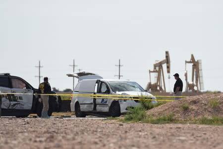 State troopers and other emergency personnel are seen following a shooting in Odessa