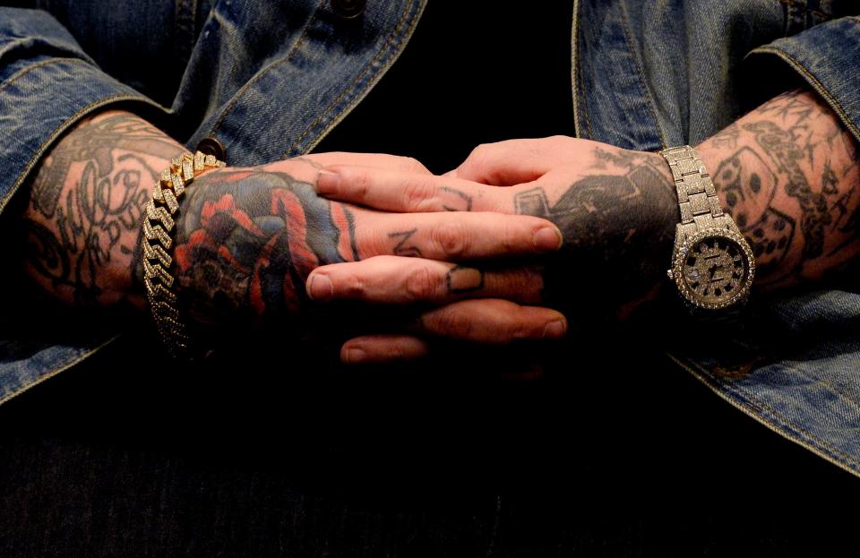 Singer Jelly Roll listens to guest speakers at ceremony honoring him for his first country No. 1 song “Son of a Sinner” at BMI on Wednesday, Jan. 18, 2023, in Nashville, Tenn.  