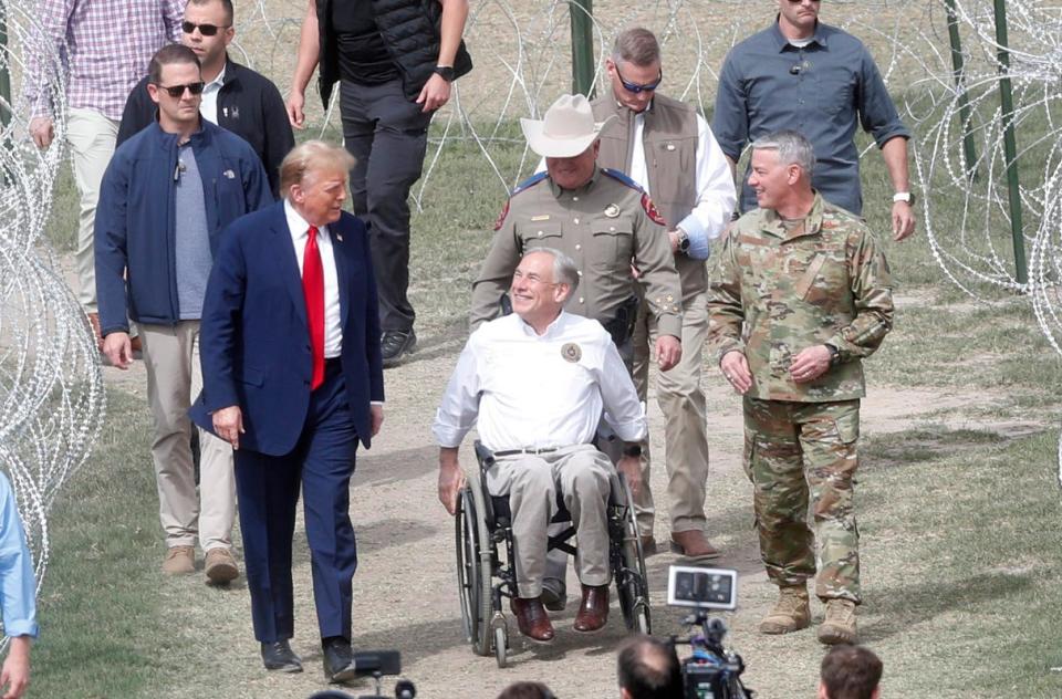 Former President Donald Trump arrives Thursday in Eagle Pass' Shelby Park, where Gov; Greg Abbott greeted him. Trump lauded Abbott's hard-line approach to the border, saying, "These are the people that are coming into our country, and they're coming from jails, and they're coming from prisons, and they're coming from mental institutions, and they're coming from insane asylums."