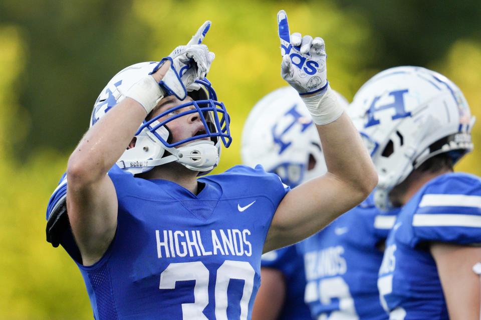 Highlands running back Sam Robinson (30) reacts after scoring a touchdown during a KHSAA high school football game against the Simon Kenton Pioneers at Highlands High School Friday, Aug. 26, 2022.