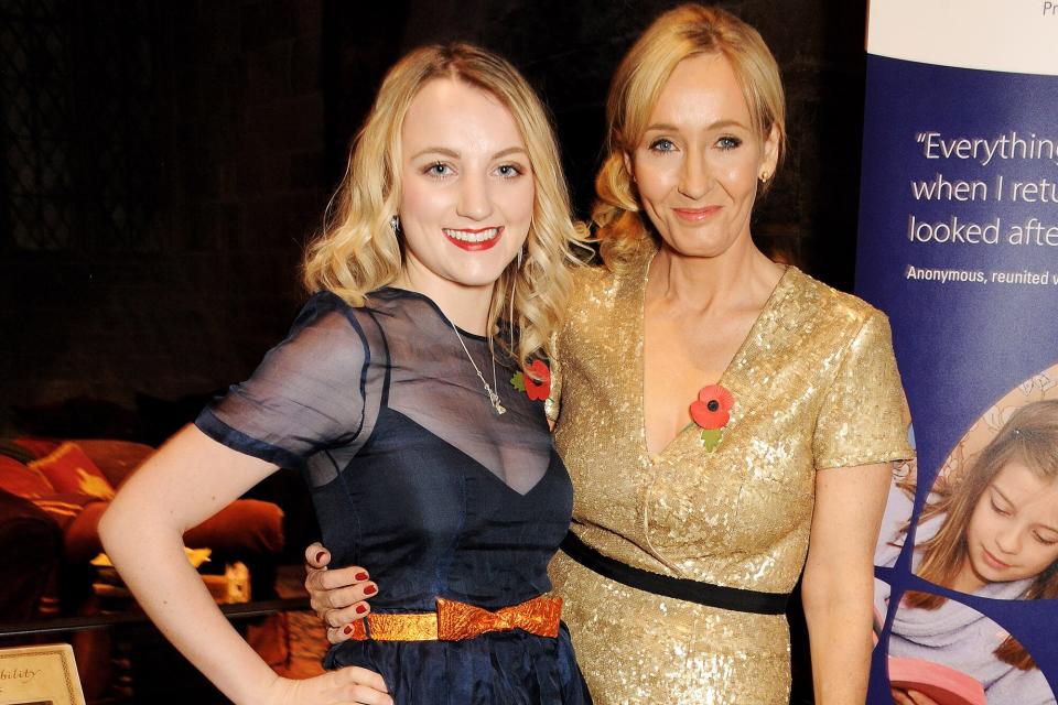 Evanna Lynch (L) and J.K. Rowling attend the Lumos fundraising event hosted by J.K. Rowling at The Warner Bros. Harry Potter Tour on November 9, 2013 in London, England.