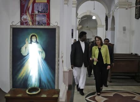 Sarah Sewall (front R), U.S. Under Secretary for Civilian Security, Democracy and Human Rights, walks inside a church in New Delhi, India, January 14, 2016. REUTERS/Anindito Mukherjee