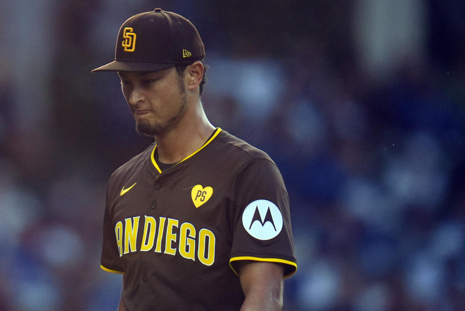 San Diego Padres starting pitcher Yu Darvish returns to the dugout after throwing against the Chicago Cubs during the second inning of a baseball game Monday, May 6, 2024, in Chicago. (AP Photo/Erin Hooley)