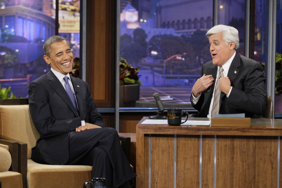 This Oct. 12, 2012 photo released by NBC shows President Barack Obama during an interview with host Jay Leno on "The Tonight Show with Jay Leno," in Burbank, Calif. After 22 years, Leno will host his last show on Thursday, Feb. 6, 2014. (AP Photo/NBC, Paul Drinkwater)