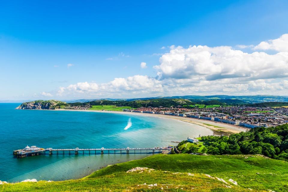 A view of Llandudno and its pier on a beautiful summer’s day (Getty Images/iStockphoto)
