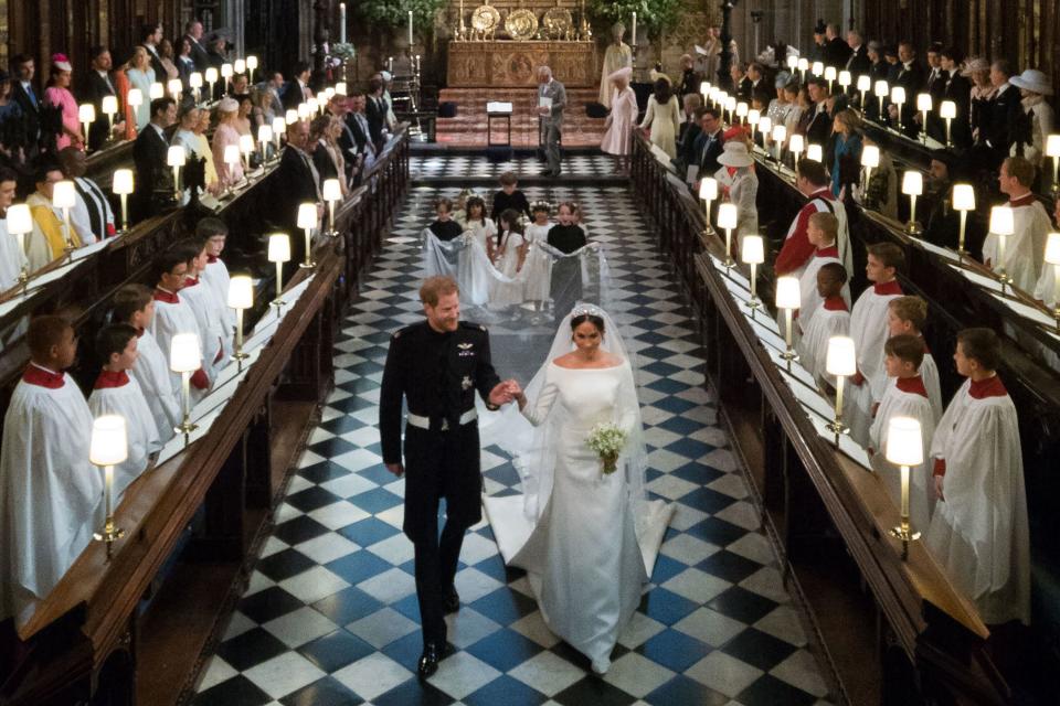 The Duke and Duchess of Sussex leave St. George's Chapel after their wedding ceremony.