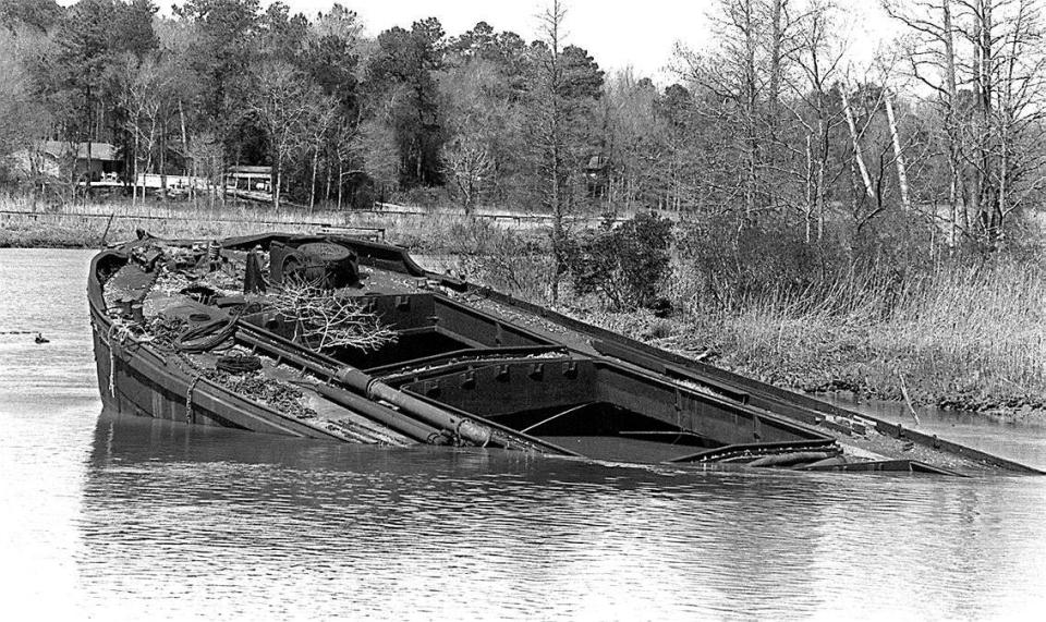 The USS Belville/Leland, seen in this photo taken March 15, 1993. The former barge had sunk further into the Brunswick River than it had previously been after a storm a couple of days earlier.