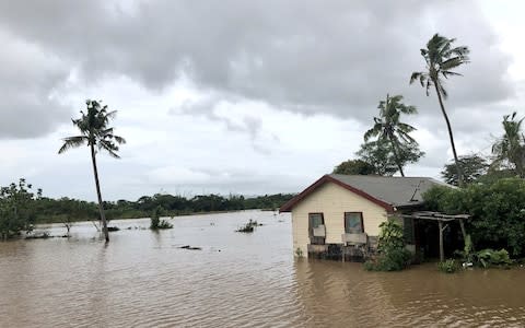 Torrential rains and heavy flooding is becoming a recurring theme on the tiny Pacific islands - Credit: REUTERS