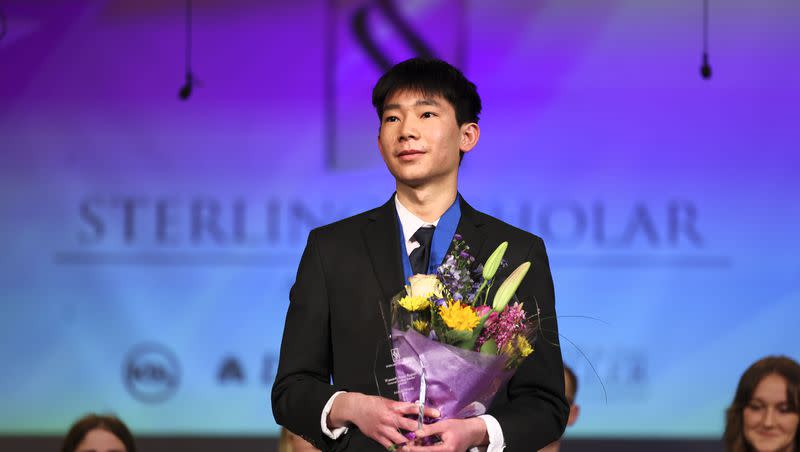 Aaron Wang of Skyline High School accepts the General Sterling Scholar award during the 2023 Sterling Scholar awards ceremony in North Salt Lake on Wednesday, March 22, 2023. He also won the top prize in the scholarship program’s computer science category.