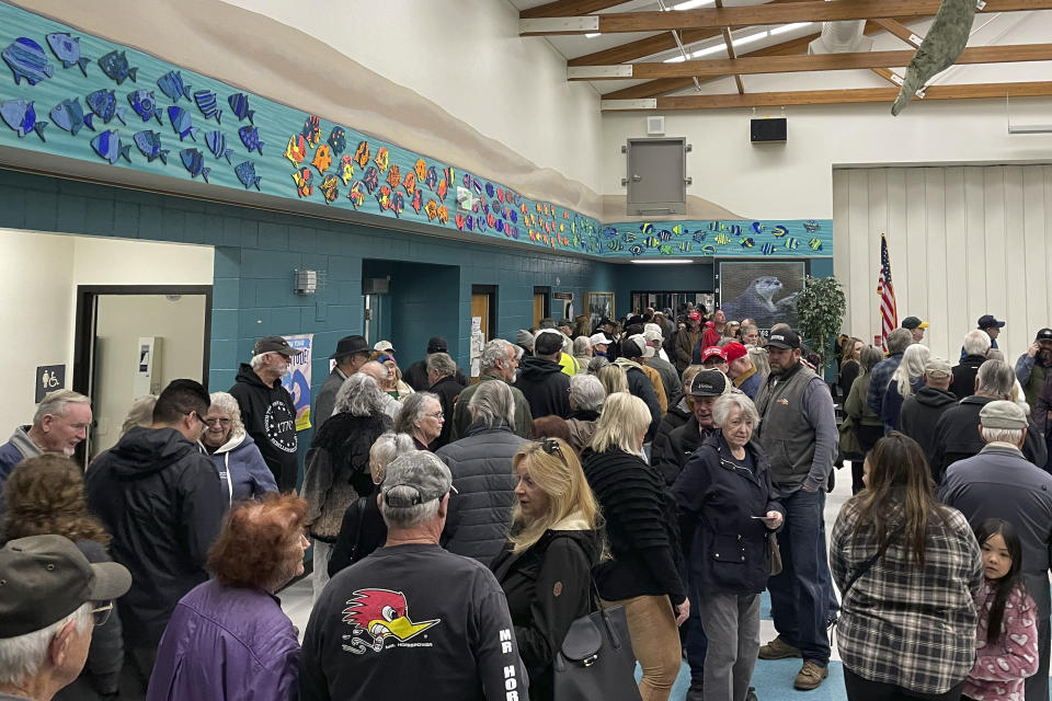 People wait for the caucus to begin at Spanish Springs Elementary School in Sparks, Nev., Thursday, Feb. 8, 2024. (AP Photo/Gabe Stern)