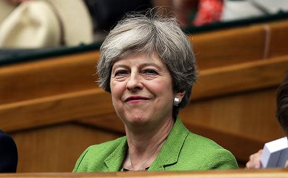 May remains wedded to the discredited target to reduce net migration below 100,000 a year: PA