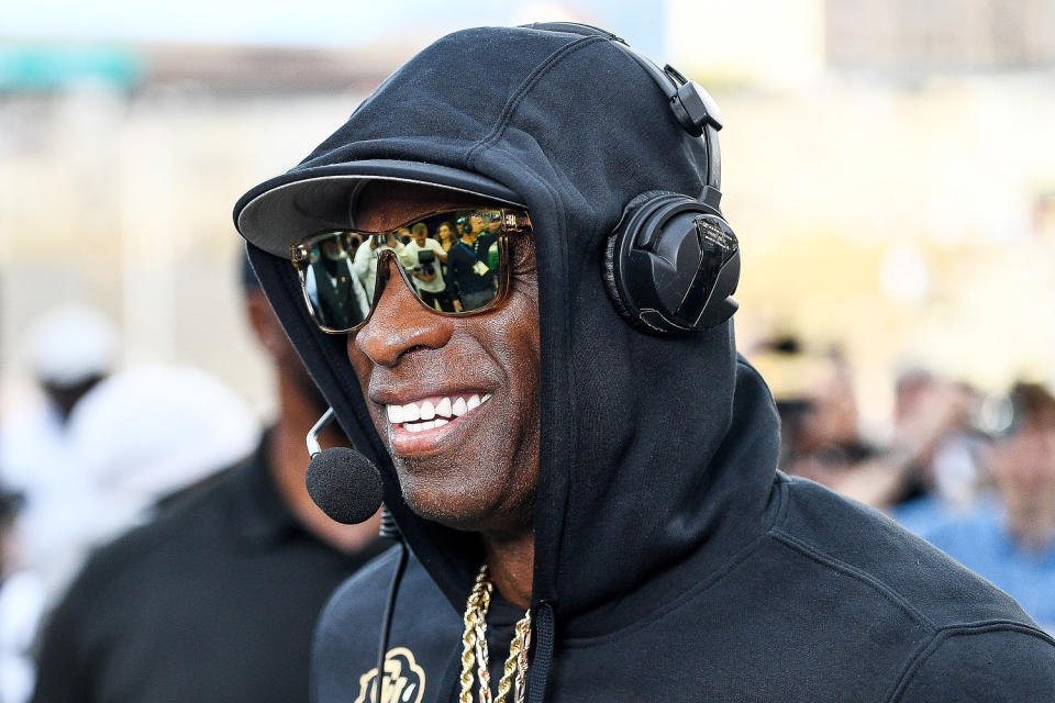 Head coach Deion Sanders gives a pregame interview before a game  in Boulder, Colo. (Dustin Bradford / Getty Images)