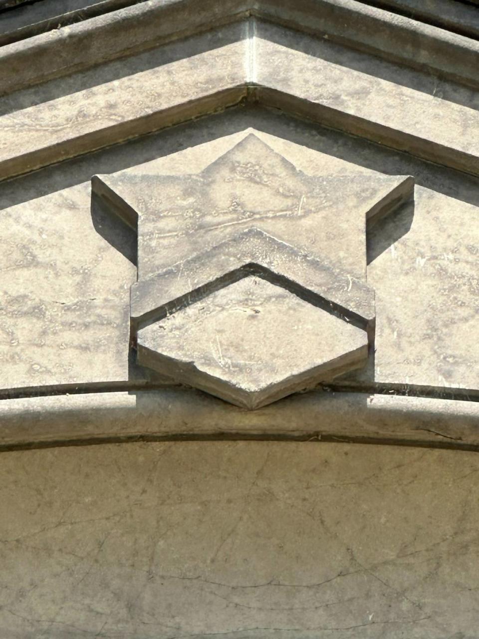 At the peak of the second story of the Assay Office building, 210 W. Main St. in Boise, is a carved logo of the U.S. Treasury Department, which built the building in 1871 to be used as an assay office, processing gold and silver from 1872-1932. Scott McIntosh/smcintosh@idahostatesman.com