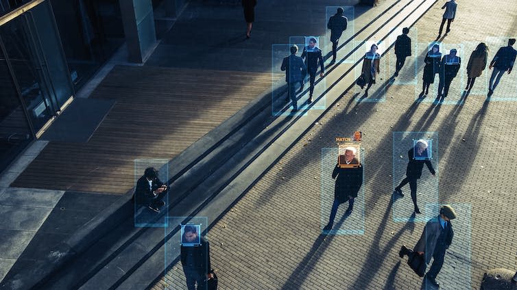 Facial recognition in a crowd.