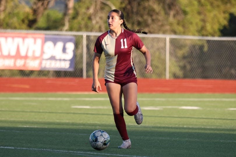 Rouse junior Ashley Perez dribbles the ball up the field vs. San Antonio Southwest in a Class 5A area round playoff game Thursday, March 28, 2024 at Wimberley High School.