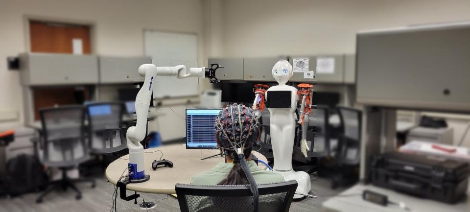 Brain-computer interfaces could allow people to control robotic arms by thought alone. Ramana Kumar Vinjamuri, <a href="http://creativecommons.org/licenses/by-nd/4.0/" rel="nofollow noopener" target="_blank" data-ylk="slk:CC BY-ND;elm:context_link;itc:0;sec:content-canvas" class="link ">CC BY-ND</a>