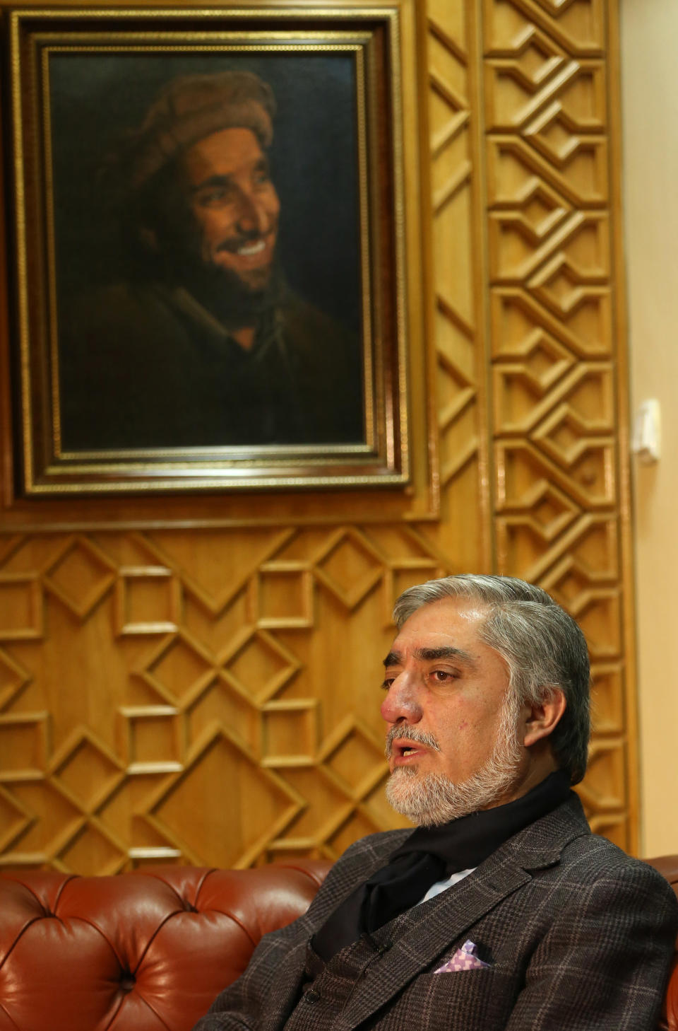 Afghan presidential candidate Abdullah Abdullah talks during an interview with Associated Press at his residence in Kabul, Afghanistan, Thursday, March 13, 2014. One of the main front-runners in the race to succeed Afghan leader Hamid Karzai tells The Associated Press that he will sign a security agreement with the United States within a month if he wins the race. Abdullah Abdullah criticized Karzai for refusing sign the deal, which would pave the way for international forces to keep a residual force in Afghanistan after withdrawing combat troops by the end of 2014. (AP Photo/Massoud Hossaini)