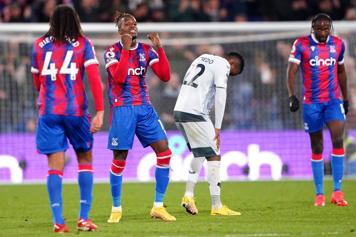 Wilfried Zaha, second left, celebrates victory over Wolves (Zac Goodwin/PA) (PA Wire)