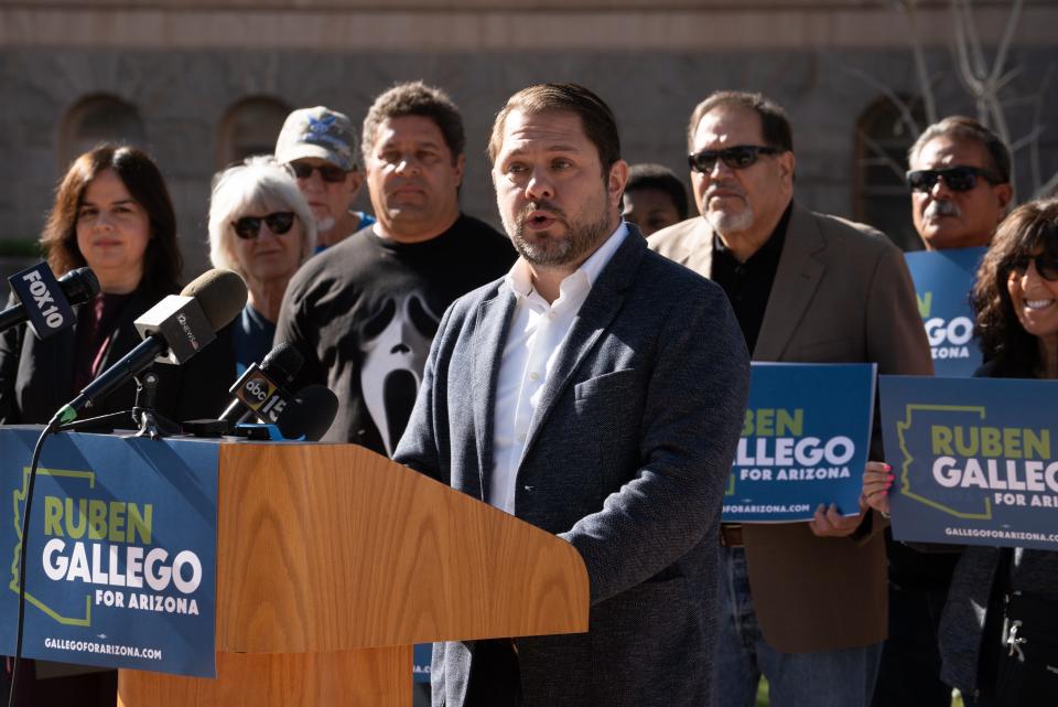 U.S. Senate candidate Ruben Gallego (center) holds a press conference before submitting signatures to the Secretary of State's office, on March 4, 2024, at the Arizona State Capitol in Phoenix.