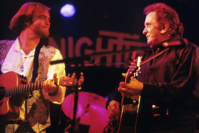 <p>Rob Verhorst/Redferns</p> Johnny Cash performs with his son John Carter Cash in 1994